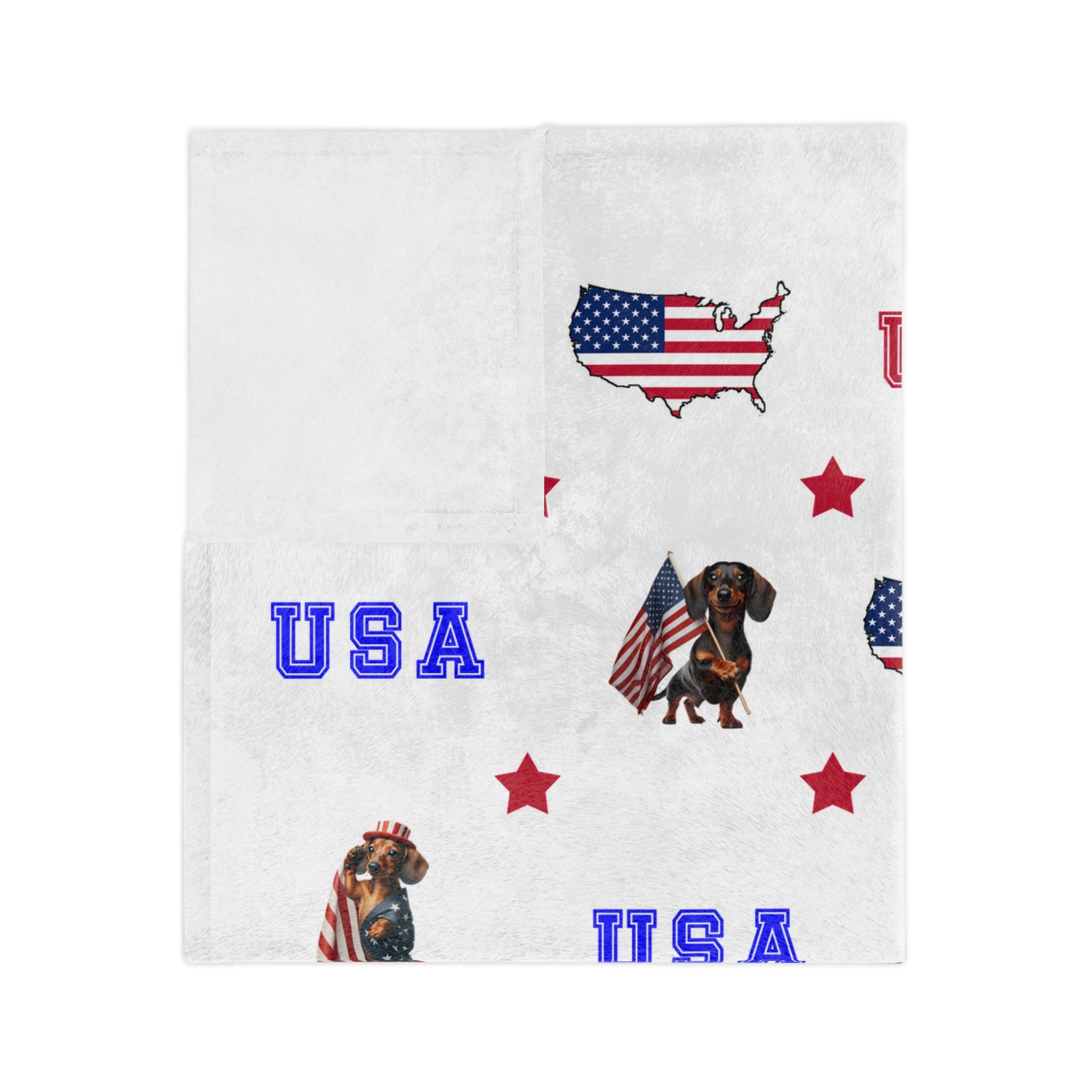 White velveteen balnket with red, white, and blue USA-themed designs including dogs and flags.