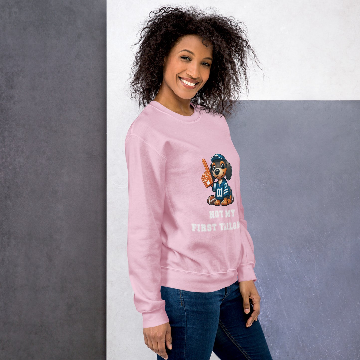 Pink unisex sweatshirt with dachshund and "Not my first tailgate"