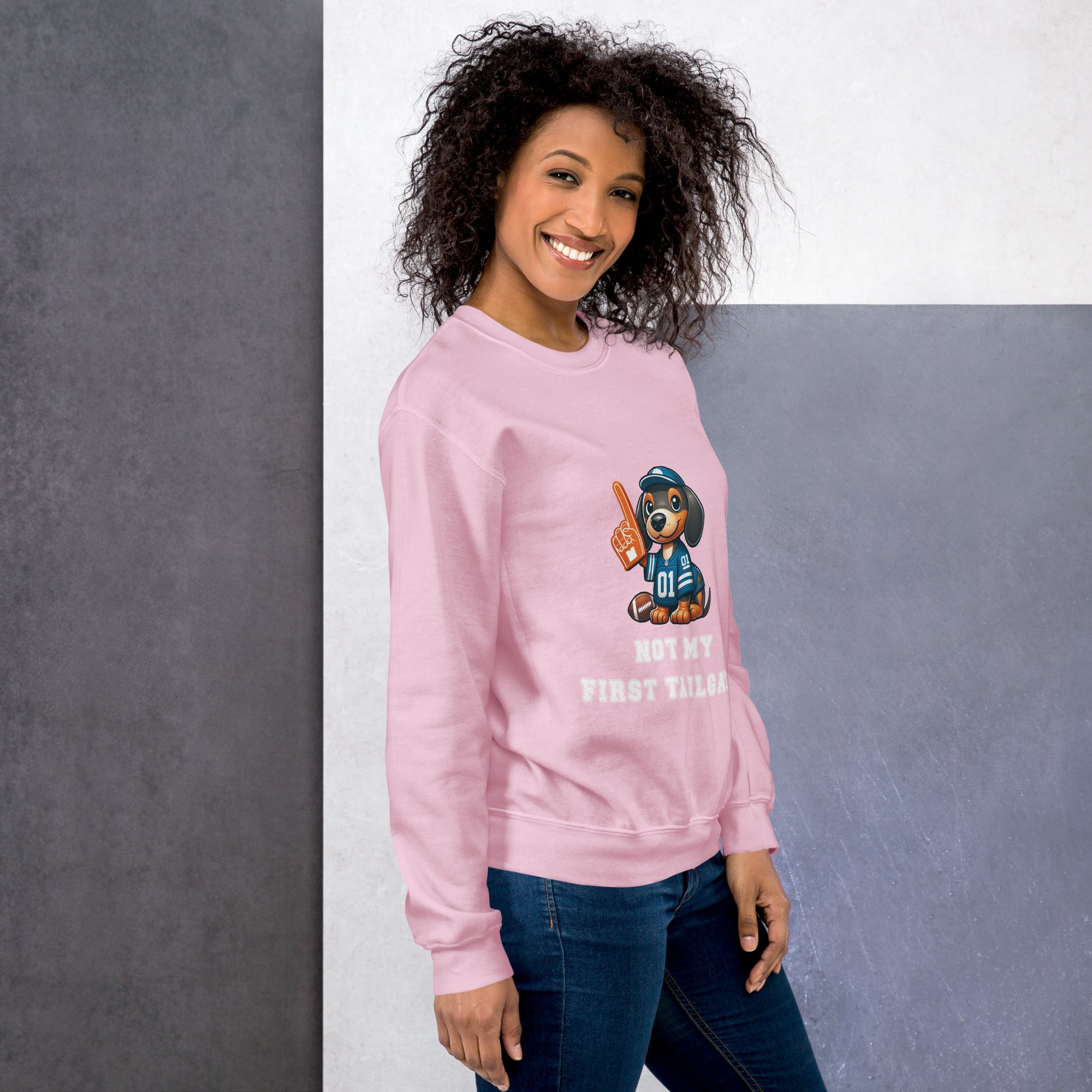 Pink unisex sweatshirt with dachshund and "Not my first tailgate"